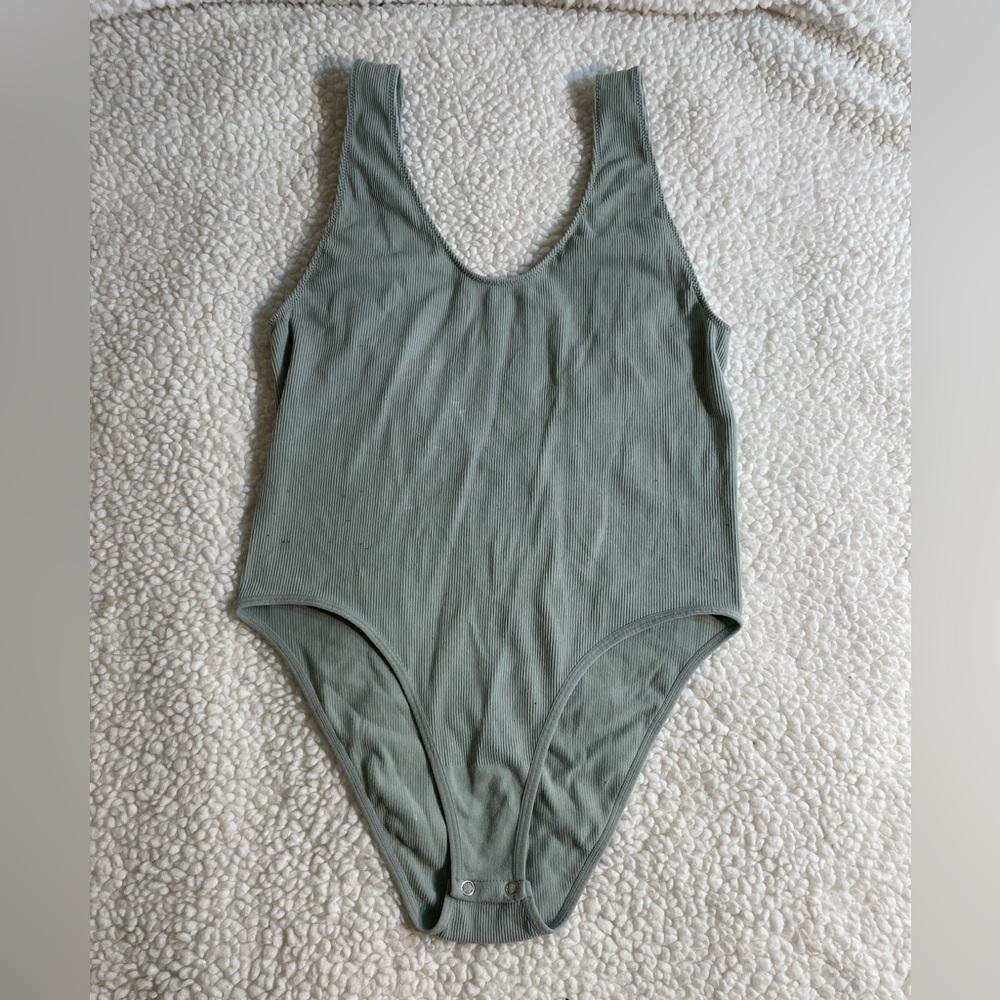 Green body suit